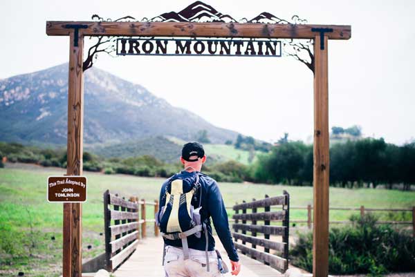 Mand Under Iron Mountain Sign